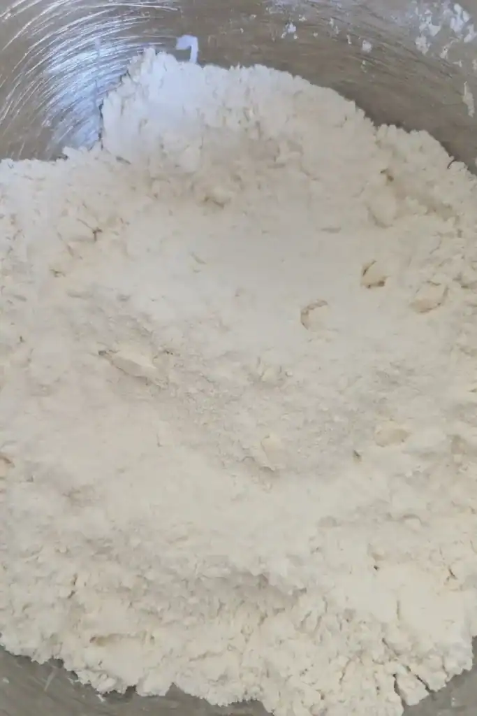 the butter mixed into the flour mixture looking granular
