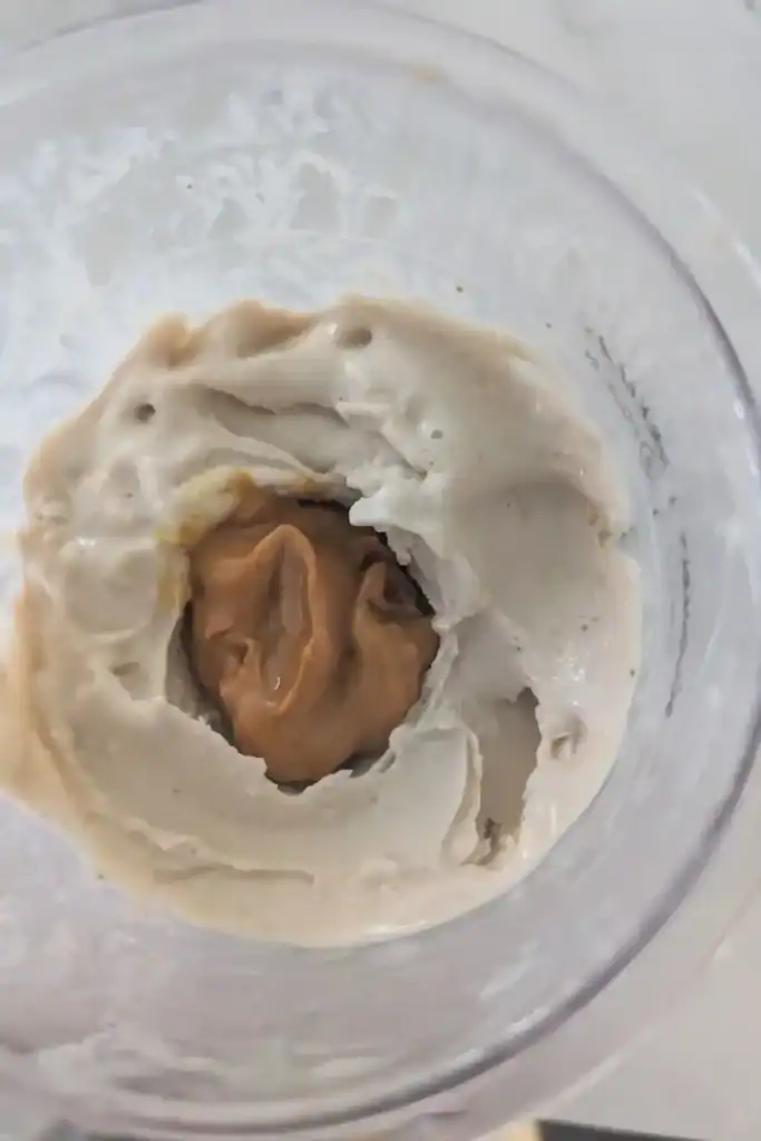 mixing in wow butter to the remaining banana ice cream