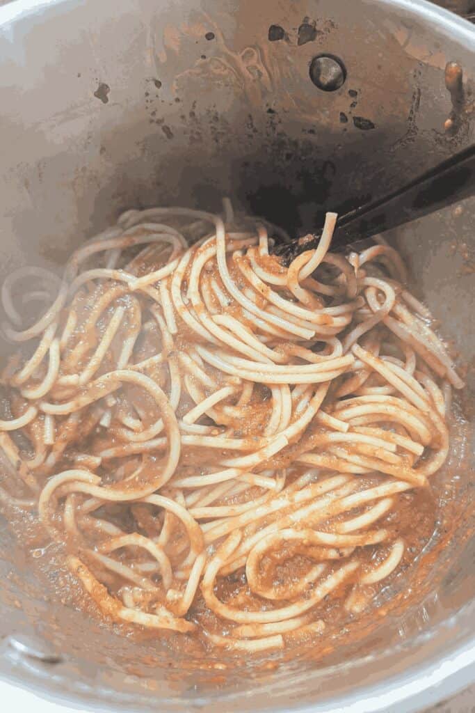 the stirred pasta with sauce