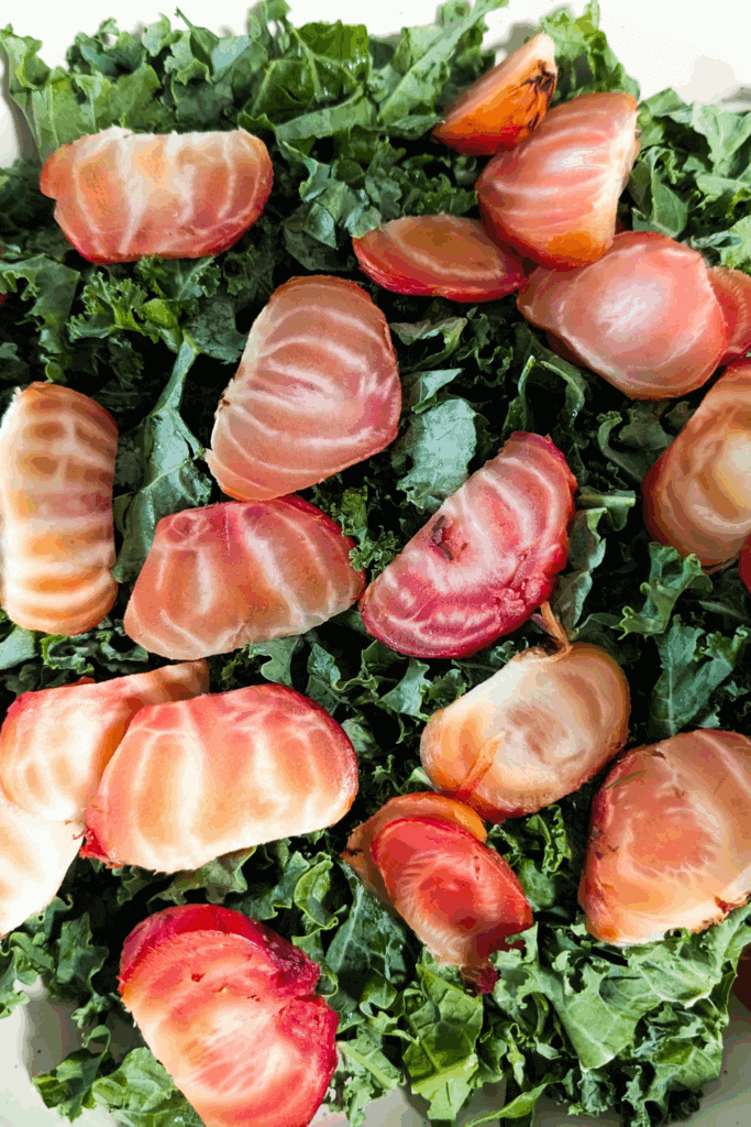 adding sliced beets to kale