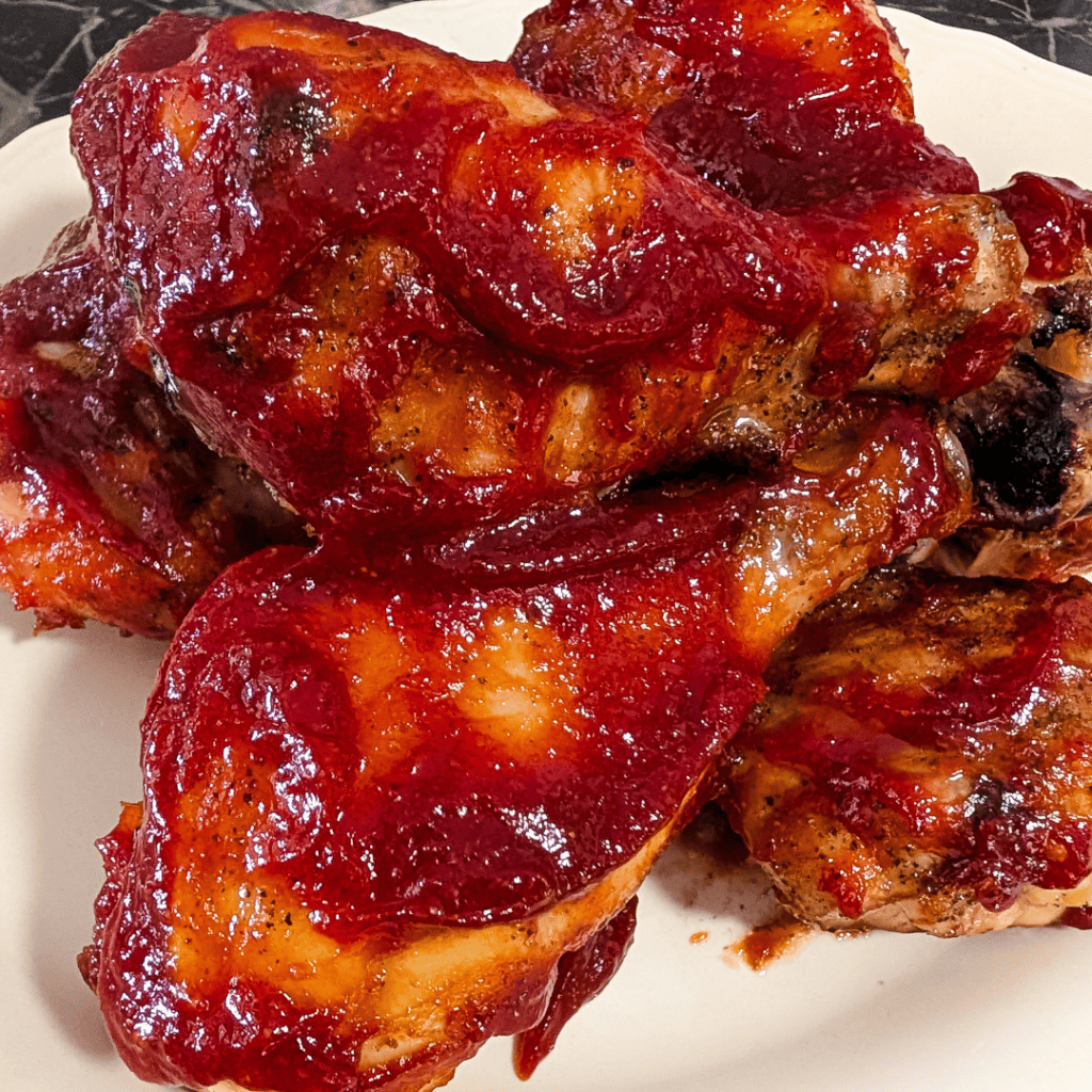 Juicy smoky BBQ chicken thighs with brown sugar glaze.