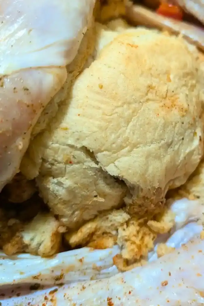 the stuffed bird cavity with a crust of bread over the opening