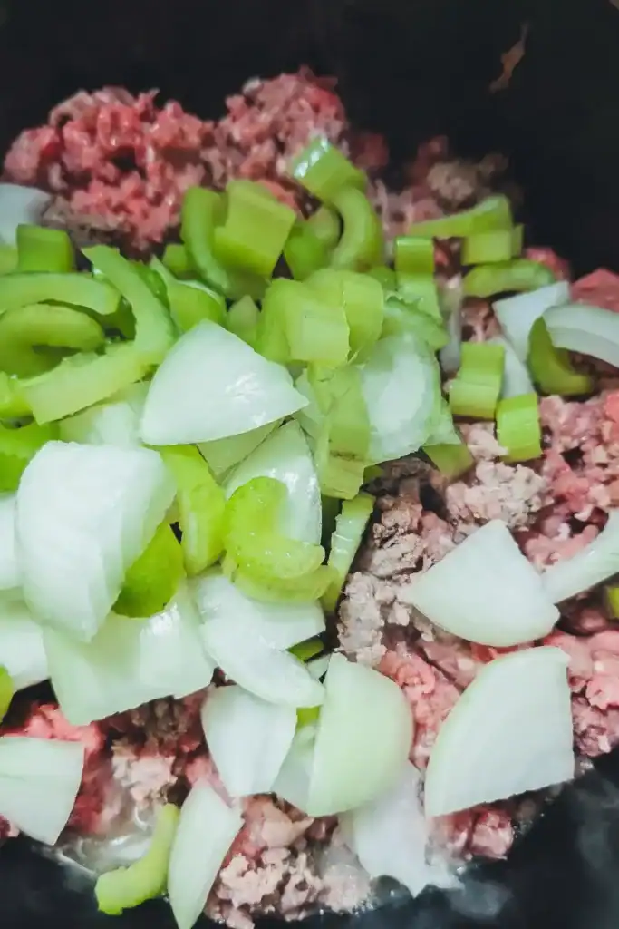 adding the celery and onion