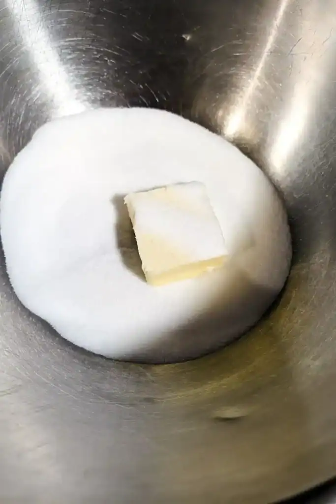 softened butter and sugar in bowl