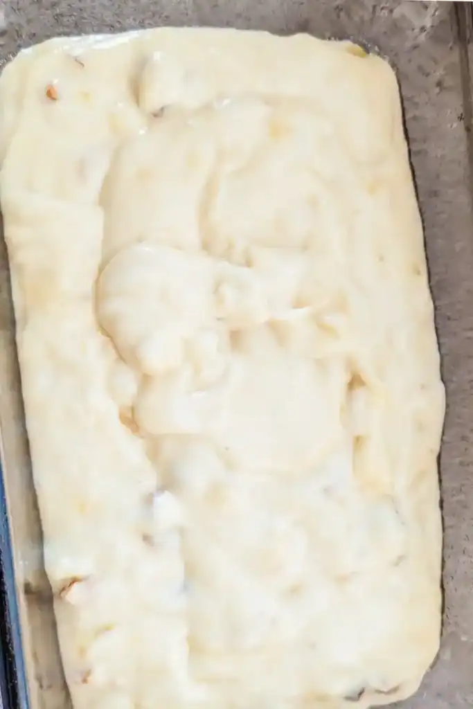 filling prepared loaf pan