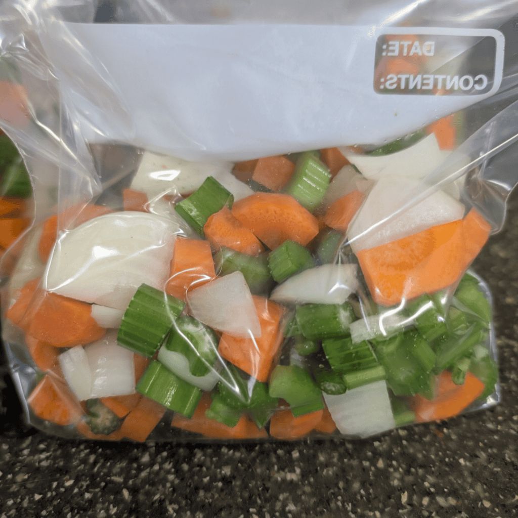 air sucked out of bags of mirepoix mix ready for freezer