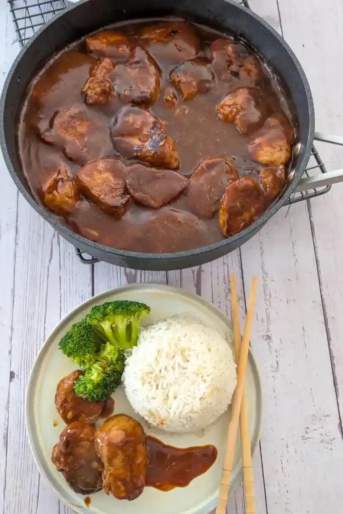 serving with seasoned rice and broccoli