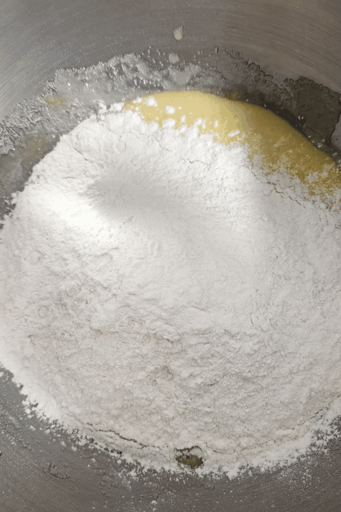 adding dry ingredients to wet ingredients