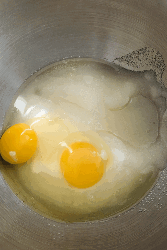 oil sugar eggs in mixing bowl