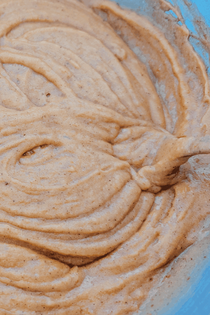 Creamy cinnamon spice frosting with a smooth texture for cake decorating and baking.
