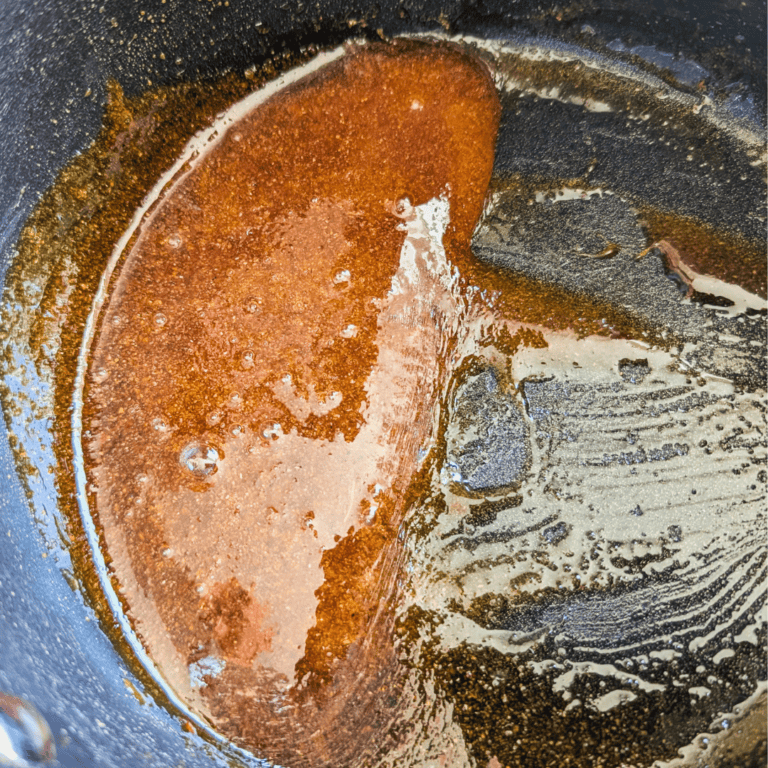 Maple glaze sauce in a pan, perfect for ribs. Made with real maple syrup for a sweet, savory flavor.