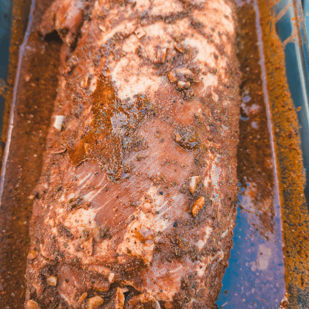 Juicy roast beef seasoned with herbs and spices, fresh out of the oven.