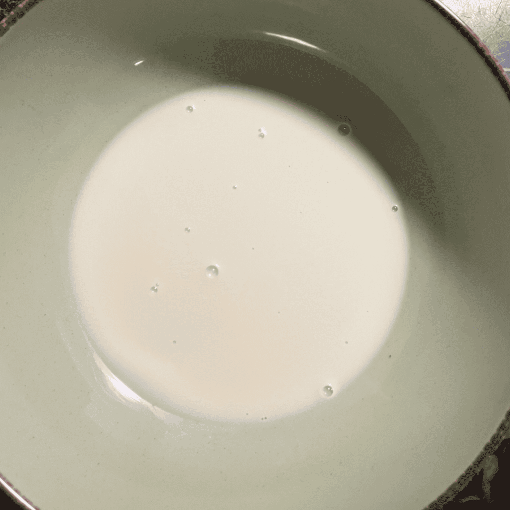 oat milk warmed in mixing bowl
