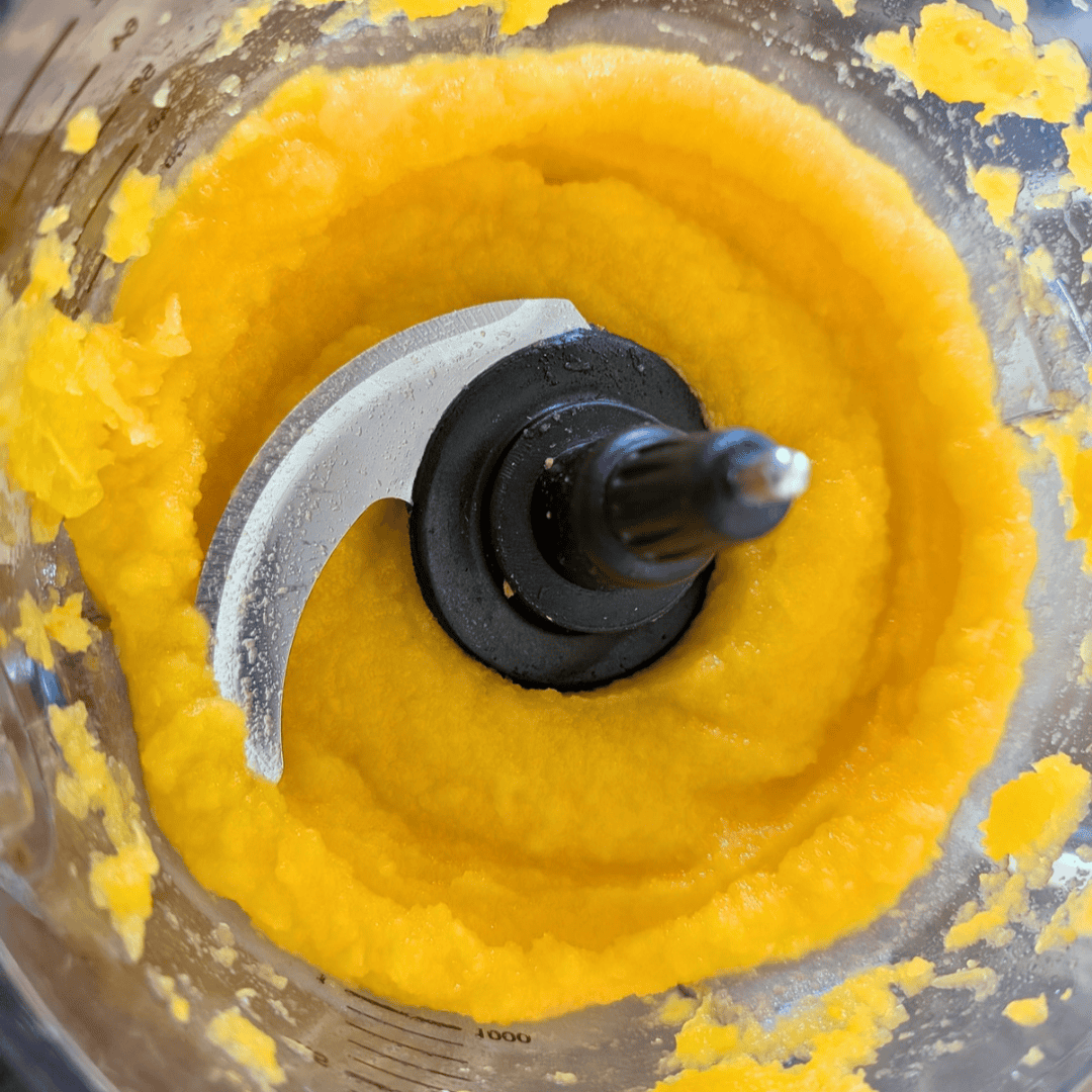 pumpkin puree in container for food processor
