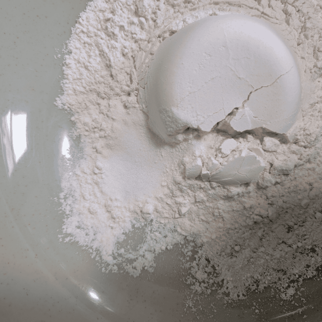 adding the flour and salt in bowl