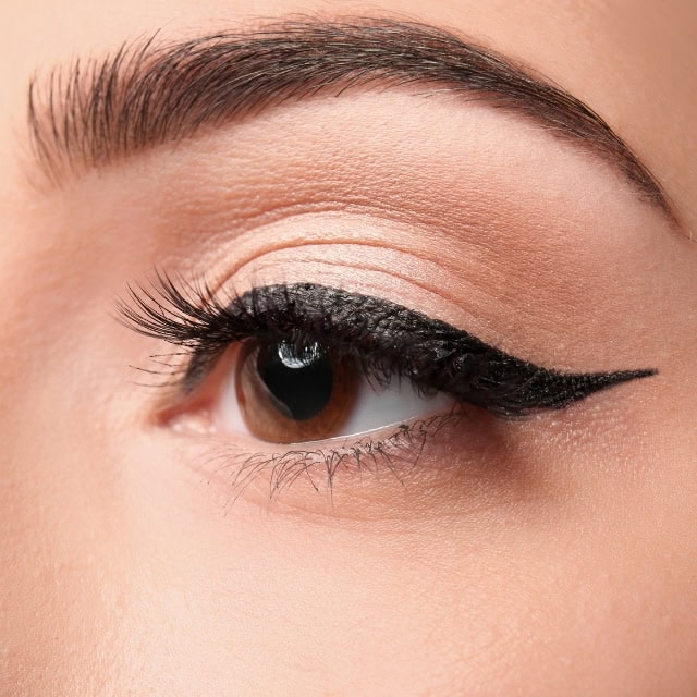 Winged permanent eyeliner in progress at Cleopatra PMU, Chantilly VA