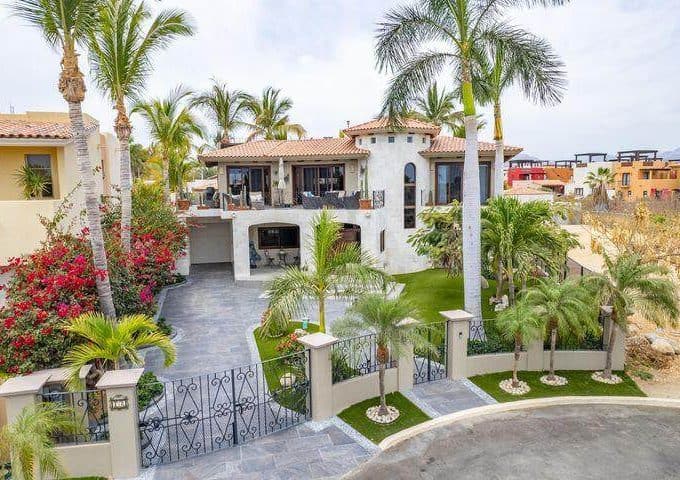 Luxury Ocean View Home With Lush Tropical Landscaping, Overlooking A Scenic Golf Course At Club Campestre Real Estate. Elegant Architecture, Spacious Outdoor Terraces, And Panoramic Vistas.