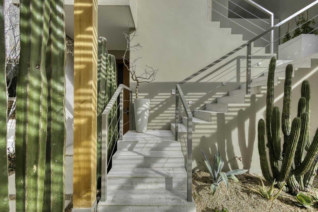 Lush Desert Plants And Modern Architecture With Ocean And Golf Course Views At Club Campestre Real Estate. Perfectly Designed For Luxury Living In A Scenic Setting.