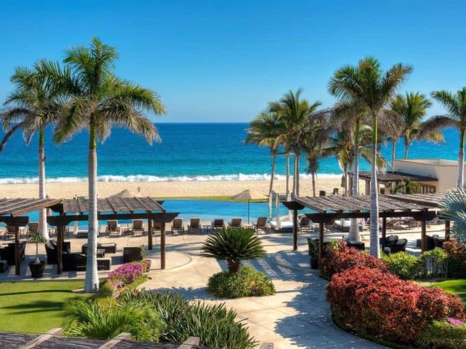 Club Campestre Ocean View Villa With Lush Landscaping And Palm Trees Overlooking The Beach.