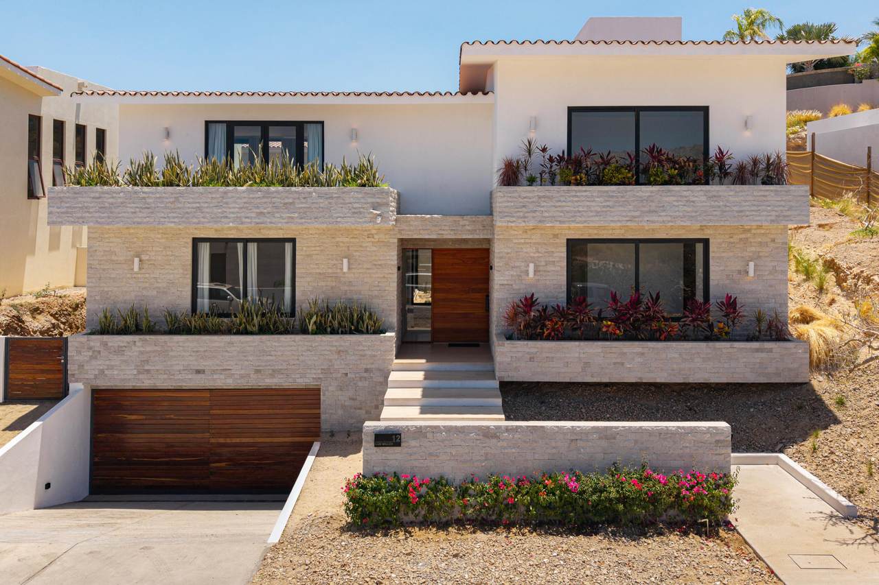 Club Campestre Luxury Villa With Modern Design And Lush Landscaping.