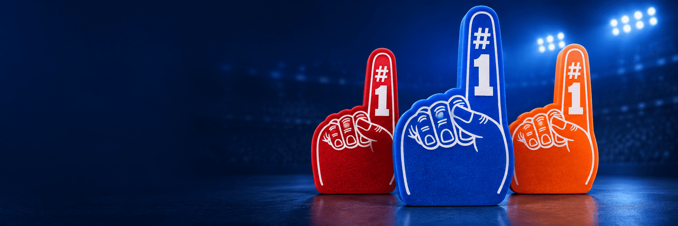 Blue, red, and orange foam fingers ready for the stands.