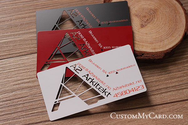 Premium custom metal business cards with laser cutout triangle design and printed contact details