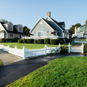 A photo of a house, possibly a suburban home with a manicured lawn. - “Home” Purchased After Buyer Is Institutionalized Counts As Resource For Medicaid
