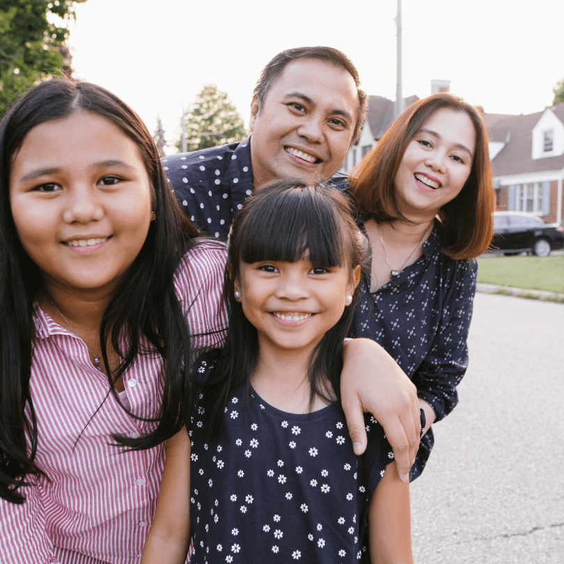 Smiling family enjoying time together outdoors, representing estate planning and beneficiary designations with elder law attorney Michael B. Cohen in Dallas, Texas.