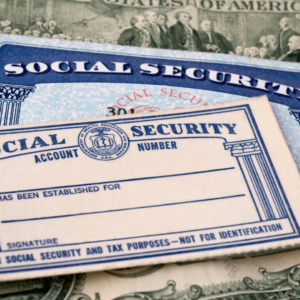 Close-up of a Social Security card and other Social Security documents, symbolizing retirement planning, social security benefits, and the impact of the Social Security Fairness Act on elder law.