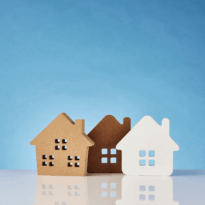 Three model houses representing Texas homesteads and the 2026 Medicaid home equity limit increase to $752,000 for single applicants.