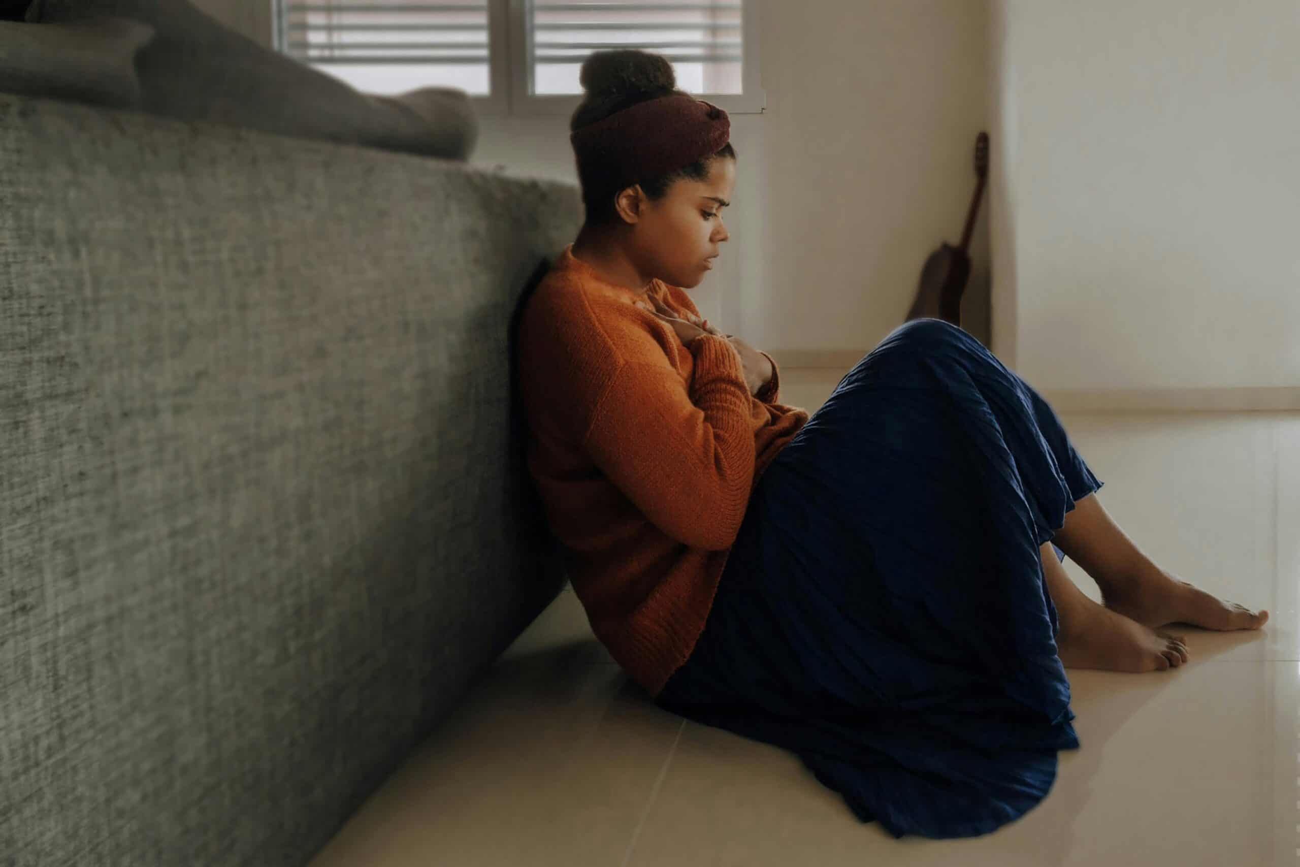 Woman sitting with her worries