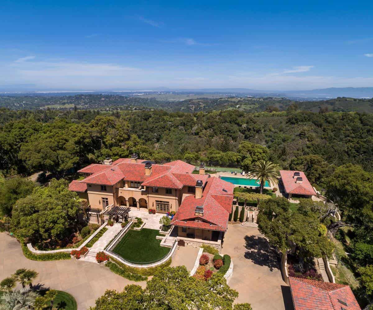 Elegant estate in Los Gatos, CA with pool and lush landscaping.