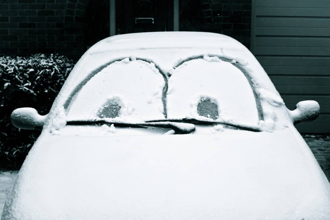 Snow covered car Snow covered car