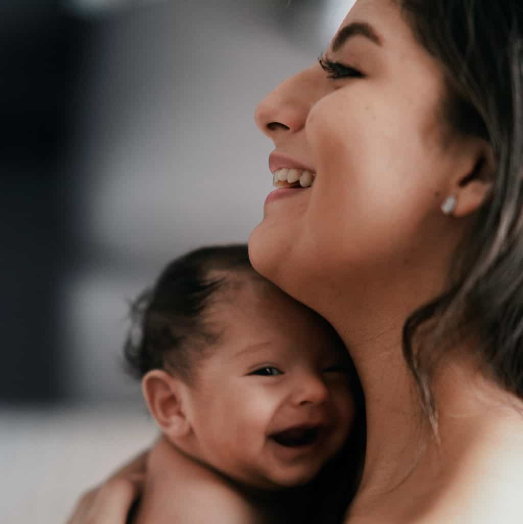 When do babies start laughing?