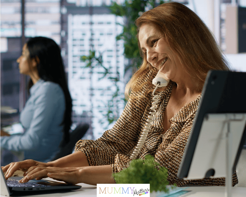 Business executive on a phone call discusses key business tasks