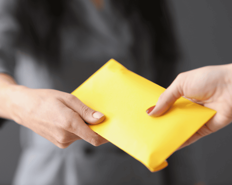 salary advance in a yellow envelope salary advance in a yellow envelope