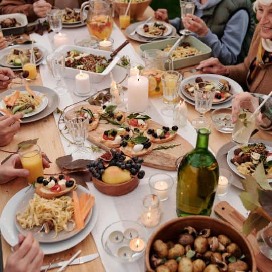 a group of people eating at a table