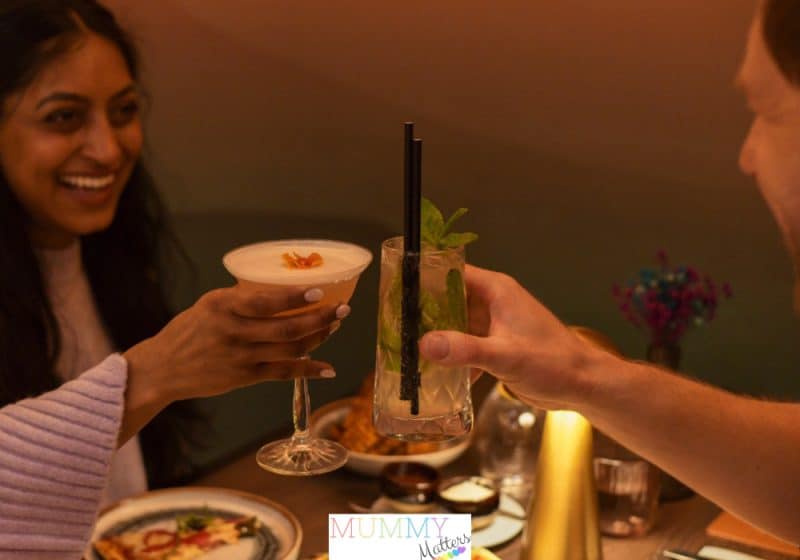 Couple enjoying drinks on a date night