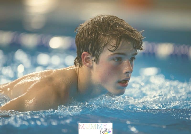 Teen boy swimming