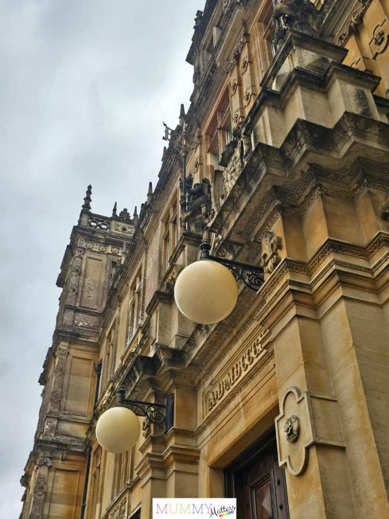 Standing at the front doors to Highclere Castle
