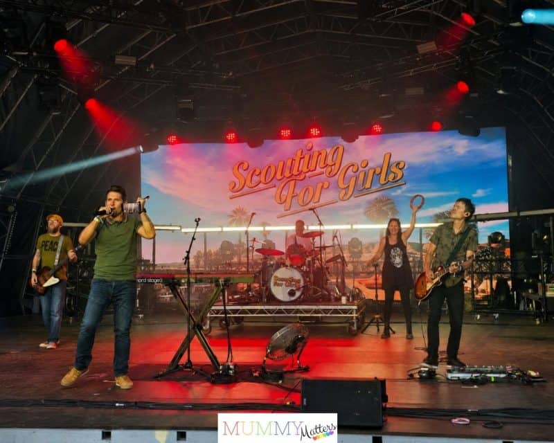 Roy Stride performing with Scouting for Girls at Lakefest with new hype woman