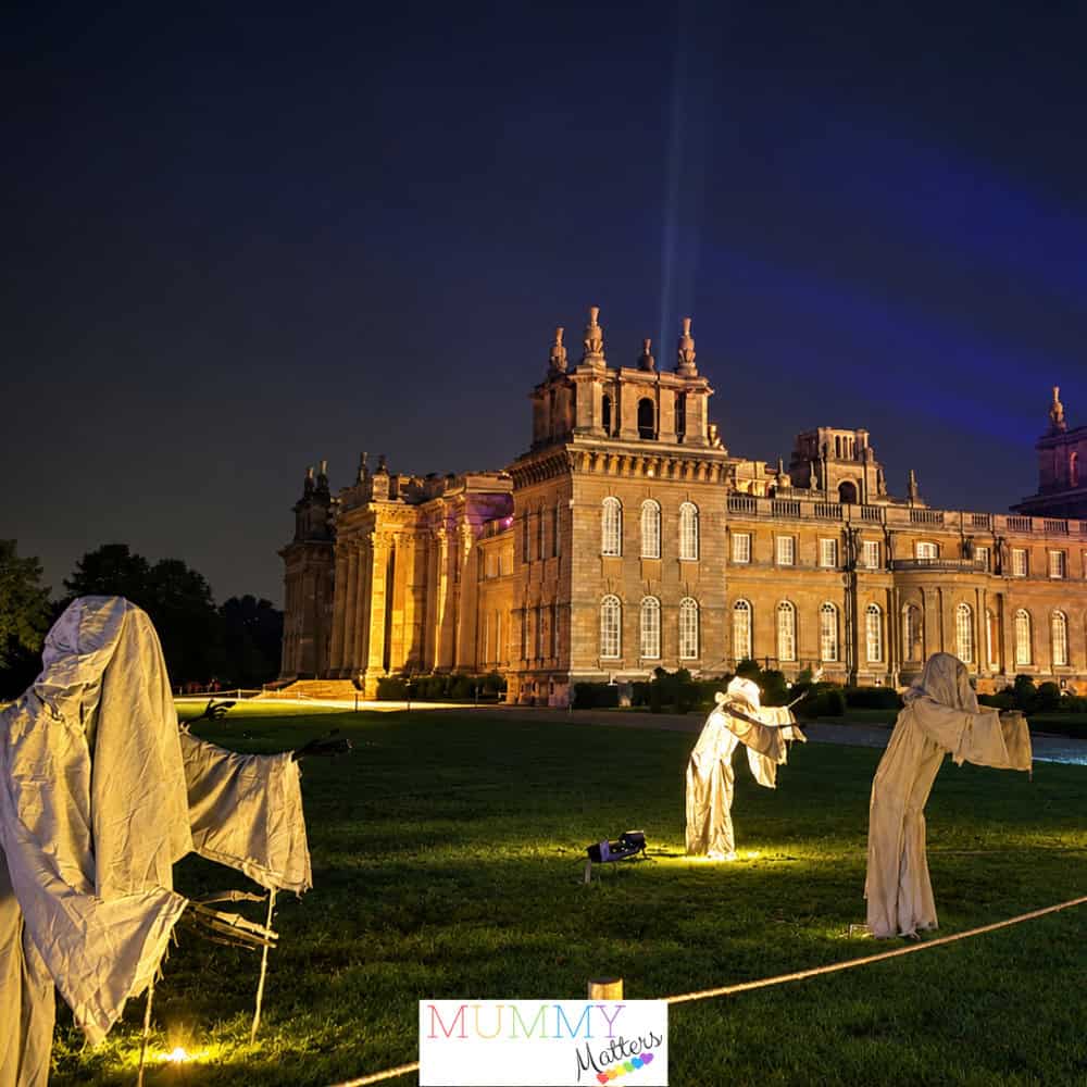 Blenheim Palace illuminated at night with ghost decorations during the Halloween Trail 2026