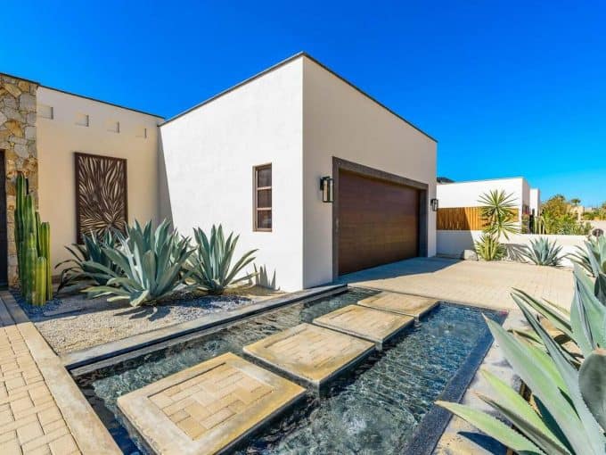 Modern Luxury Home In Diamante Cabo San Lucas, Featuring Sleek Architecture, Desert Landscaping, And Contemporary Design Elements. Diamante Properties Offer Exclusive Real Estate Opportunities.