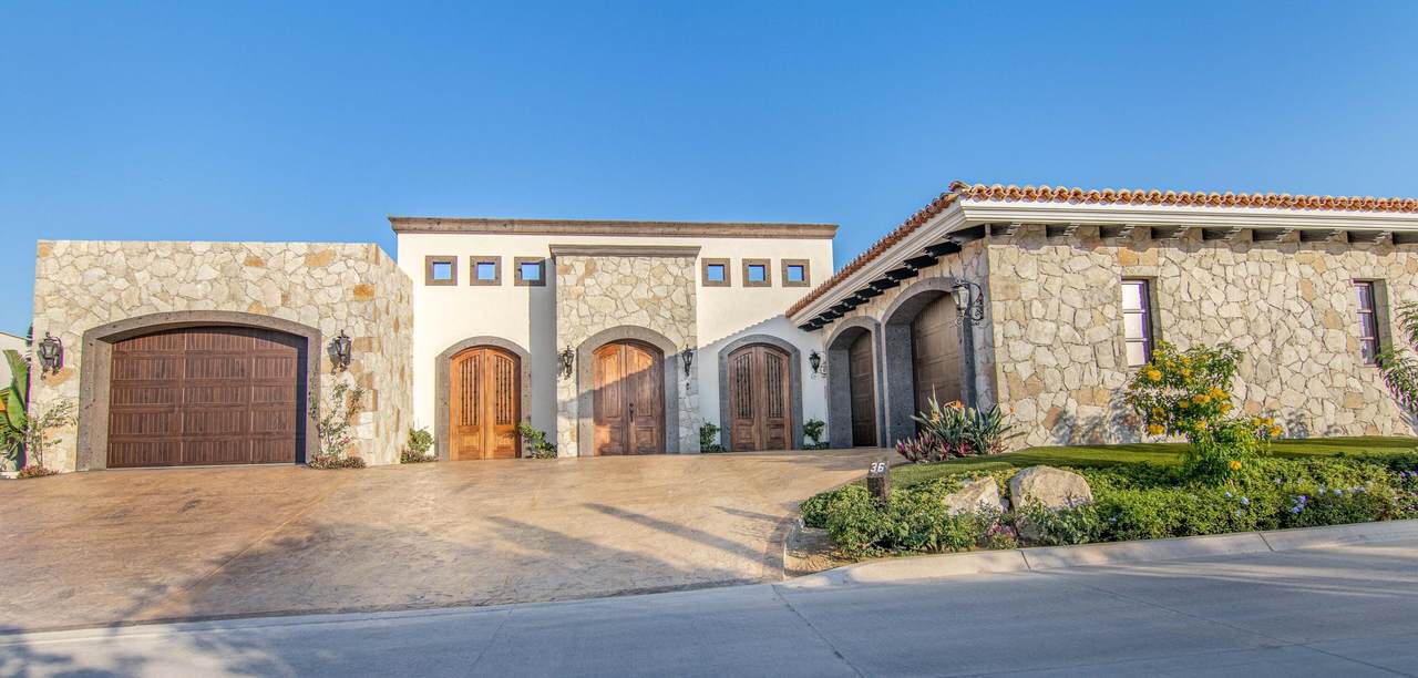 Diamante Cabo San Lucas Luxury Villa With Stone Facade And Scenic Driveway.
