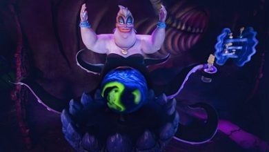 Ursula from The Little Mermaid enchants guests in her glowing lair, with swirling tentacles and a magical blue-green orb.