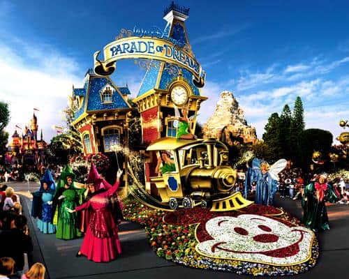Parade of Dreams float lights up Disneyland with magical fairies, a whimsical cartoon train, and vibrant Disney spectacle.