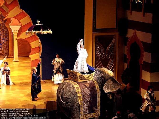 Prince Ali parades atop his grand elephant during the dazzling Aladdin stage musical, enchanting guests with Disney magic.