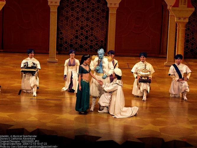 Genie, Aladdin, and Jasmine dazzle onstage at Disney's Aladdin musical—magical fun for Disney Parks and Broadway fans alike.
