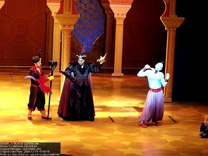 Jafar, Genie Jafar, and Genie dazzle on stage at Disney's Aladdin musical, thrilling guests with Broadway-style magic.
