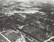 Aerial view of a massive crowd gathered in Berlin’s Lustgarten for a 1930s rally—far from the festive spirit of theme parks.